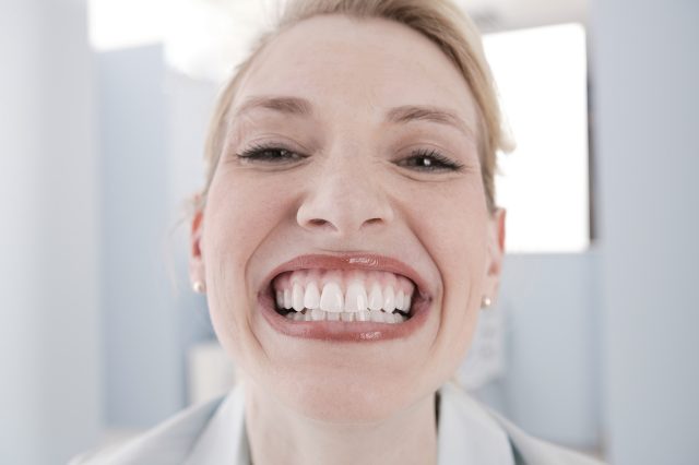 Woman grinning with perfect teeth